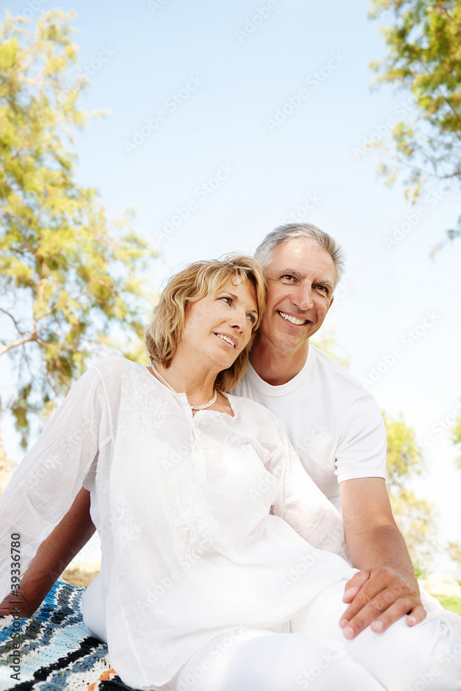 Mature couple smiling and embracing. Mature couple smiling and embracing.
