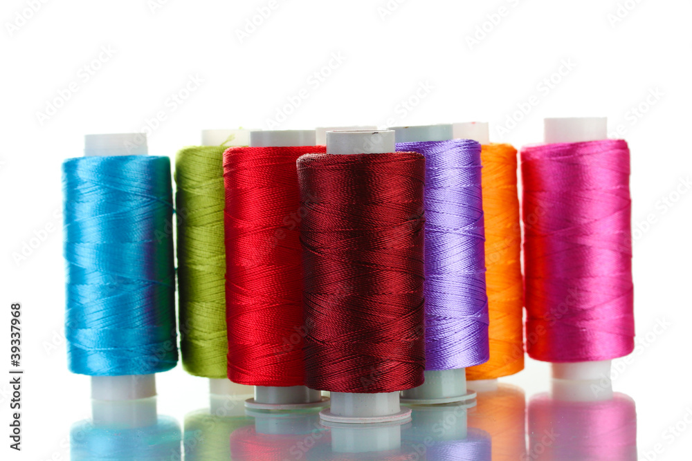 bright bobbin thread isolated on white. bright bobbin thread isolated on white.