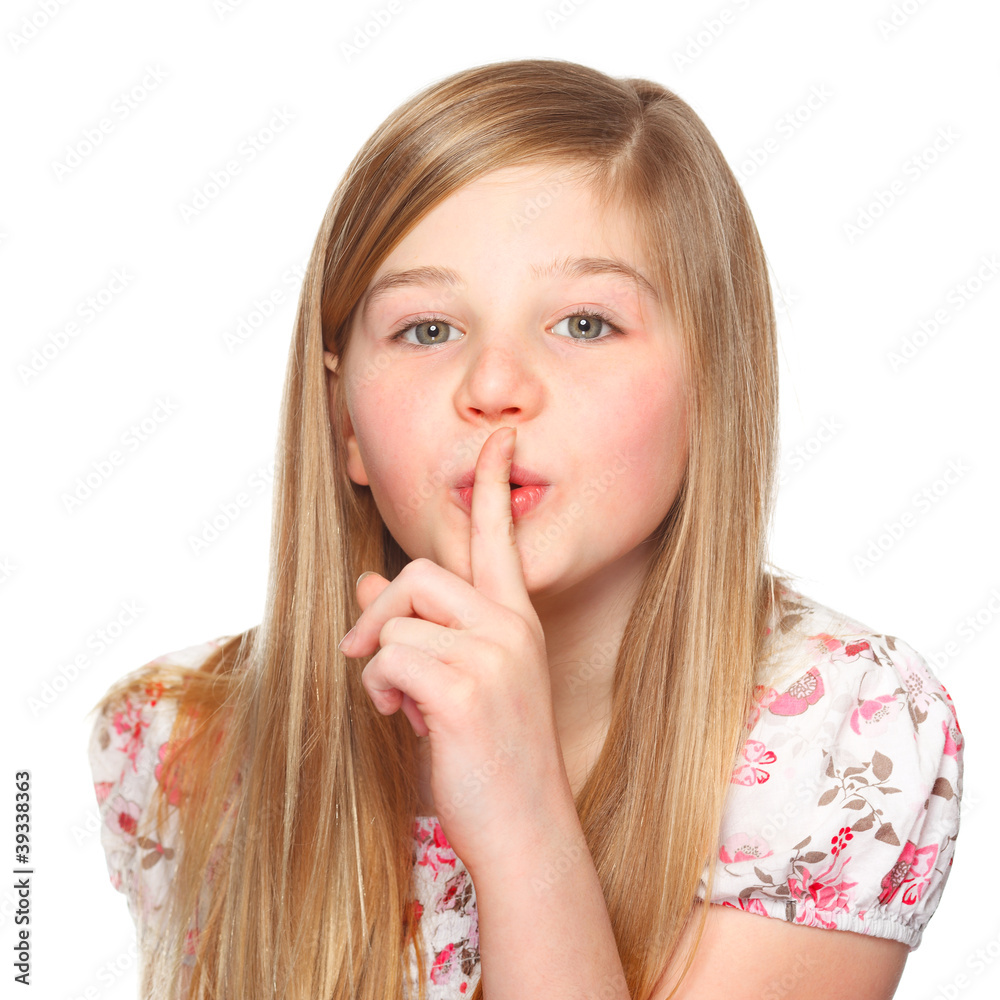 girl says be quiet with her finger on lips girl says be quiet with her finger on lips