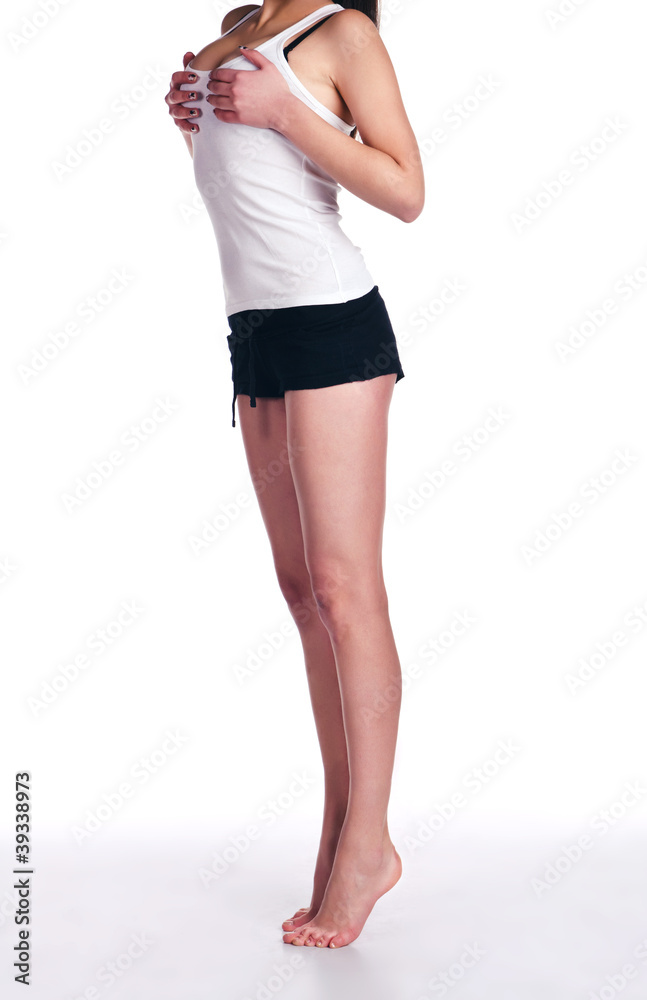 Girl with a beautiful figure stands on tiptoes Girl with a beautiful figure stands on tiptoes
