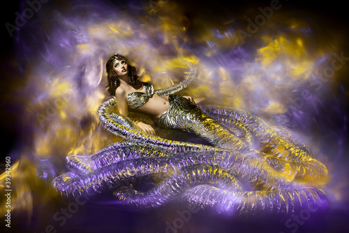 fantasy woman in snake art style dress © inarik