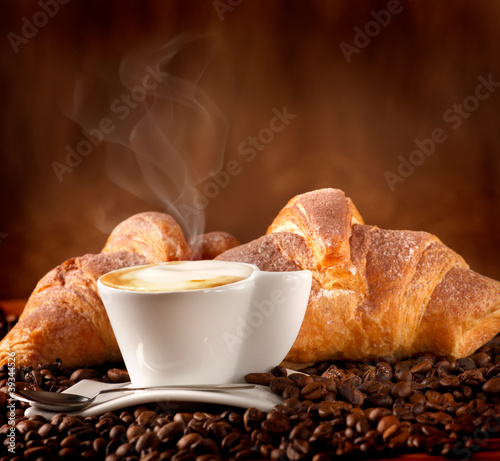 Fototapeta Colazione con cappuccino e croissant alla cioccolata
