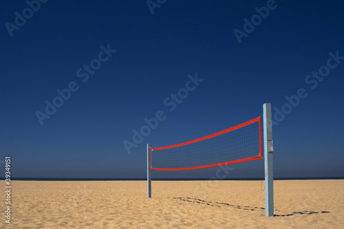 Beach Volleyball Net Under a Blue Sky