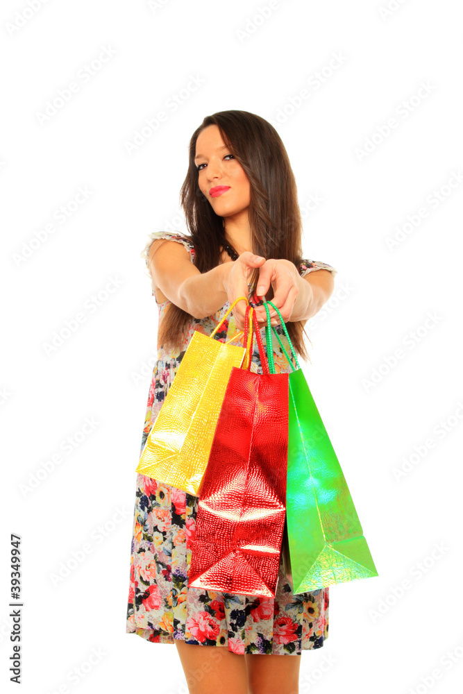 Portrait of stunning young woman carrying shopping bags Portrait of stunning young woman carrying shopping bags
