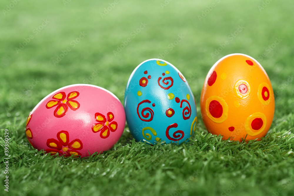 Colored eggs on lawn Colored eggs on lawn