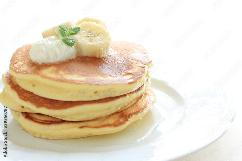 Pan cake and banana on white background Pan cake and banana on white background