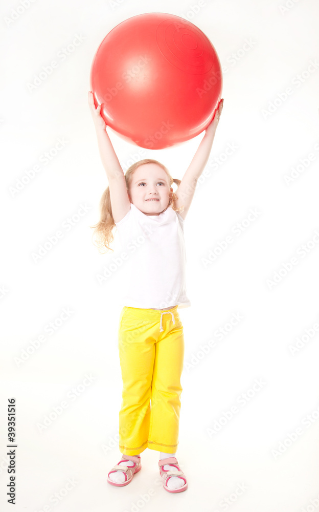 cute sly little girl doing gymnastic exercise with ball cute sly little girl doing gymnastic exercise with ball