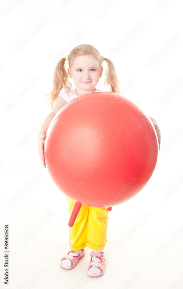 cute sly little girl doing gymnastic exercise with ball cute sly little girl doing gymnastic exercise with ball