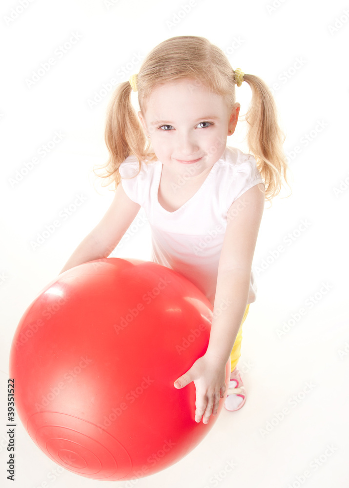 cute sly little girl doing gymnastic exercise with ball cute sly little girl doing gymnastic exercise with ball
