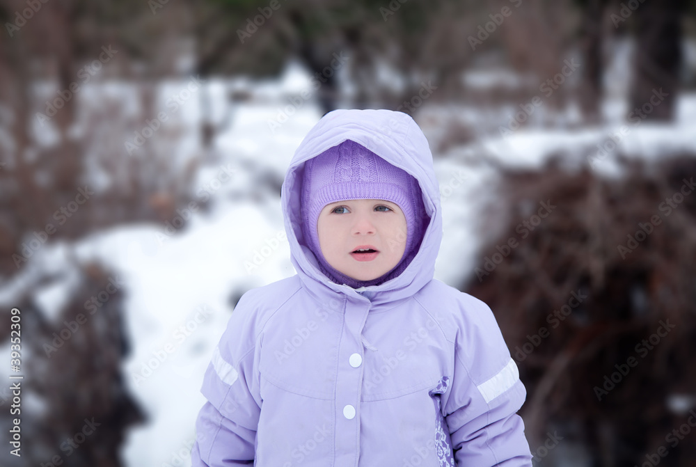 little girl in a winter park with little girl in a winter park with