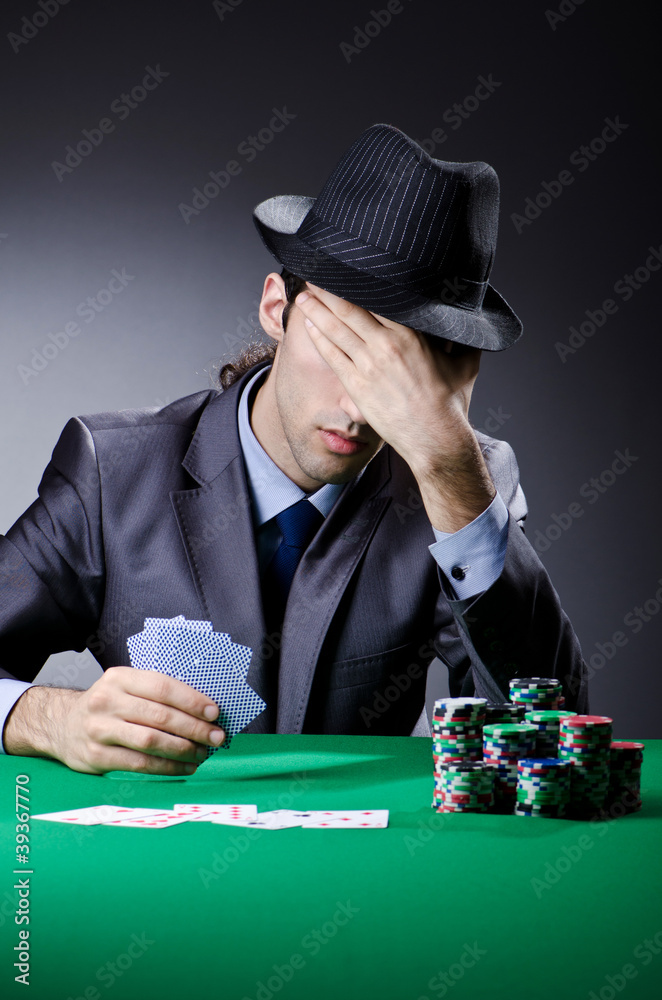 Casino player playing with chips Casino player playing with chips