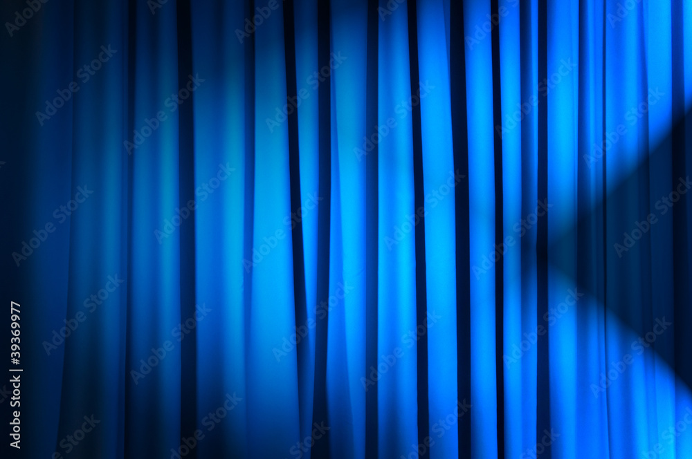 Brightly lit curtains in theatre concept