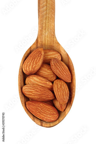 Almonds in a wooden spoon
