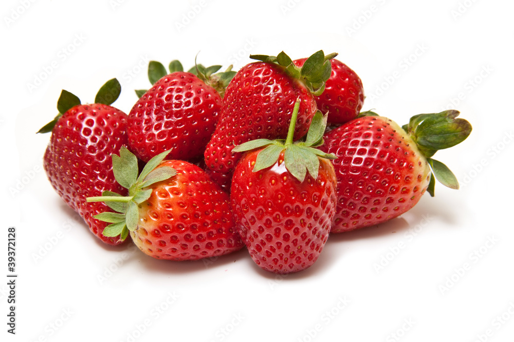 Strawberries isolated on a white studio background. Strawberries isolated on a white studio background.