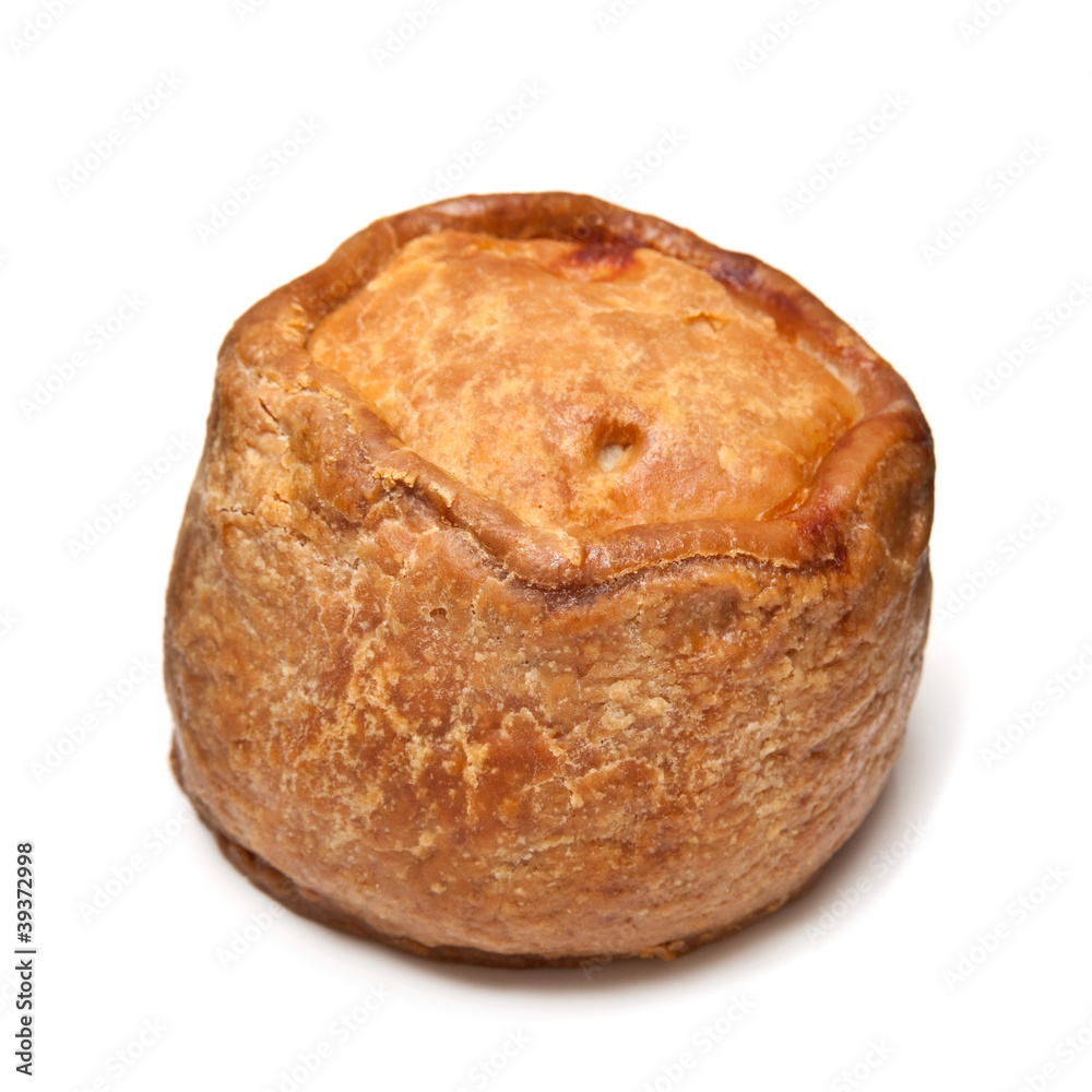 Melton Mowbray pork pie  isolated on a white studio background.