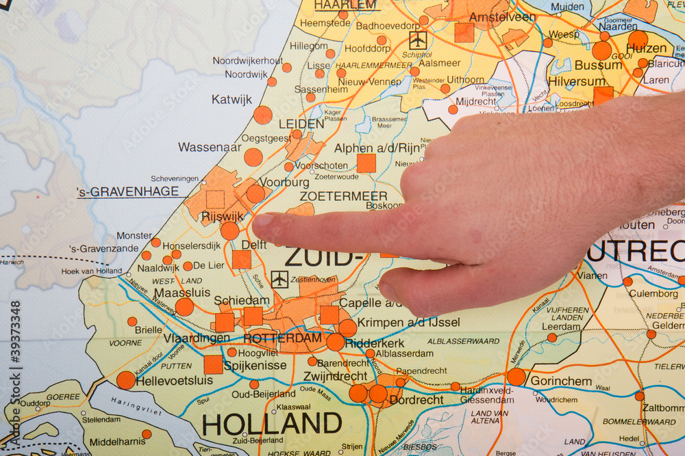 Fototapeta premium A Dutch map with a hand pointing to the governmental city The Ha