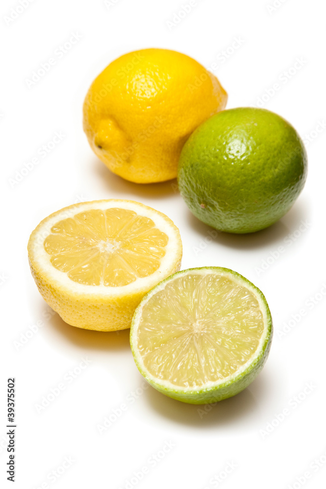 Lemons and Limes on a white studio background. Lemons and Limes on a white studio background.