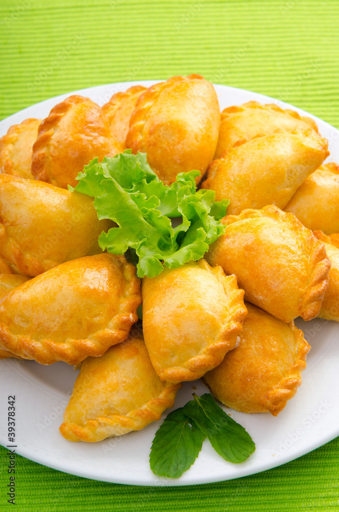 Patties stuffed with meat in the plate Patties stuffed with meat in the plate