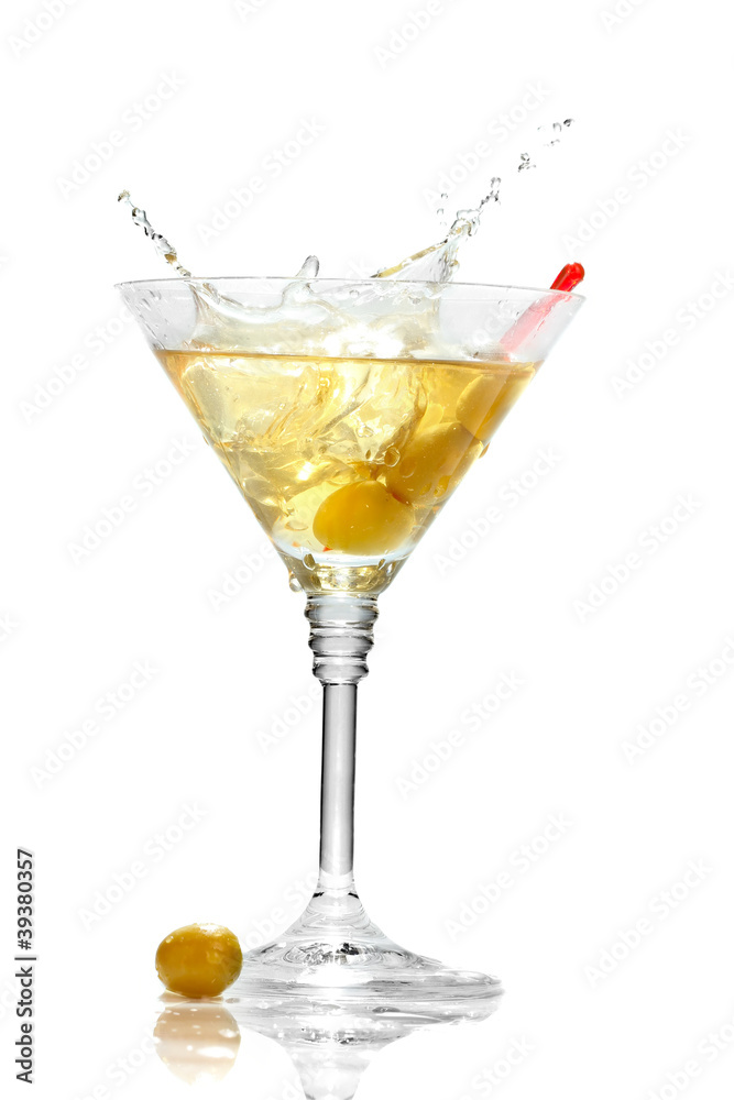 Olive splashing on martini glass isolated on white