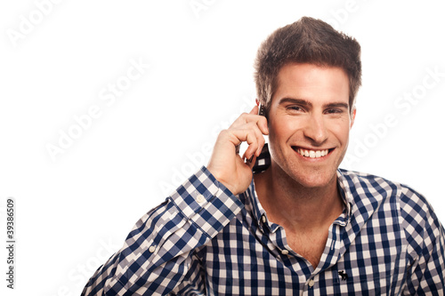 happy good looking man over the phone
