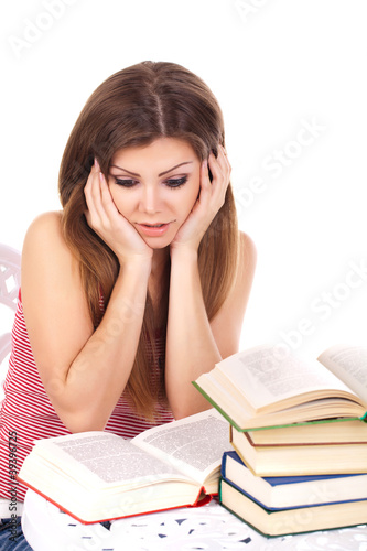 student woman with a stack of books, isolated