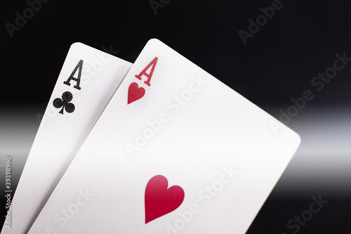 pair of aces on black photo