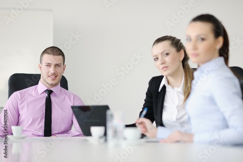 Group of young business people at meeting