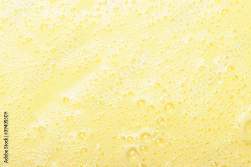 Valokuvatapetti Texture of yellow custard with some small bubbles