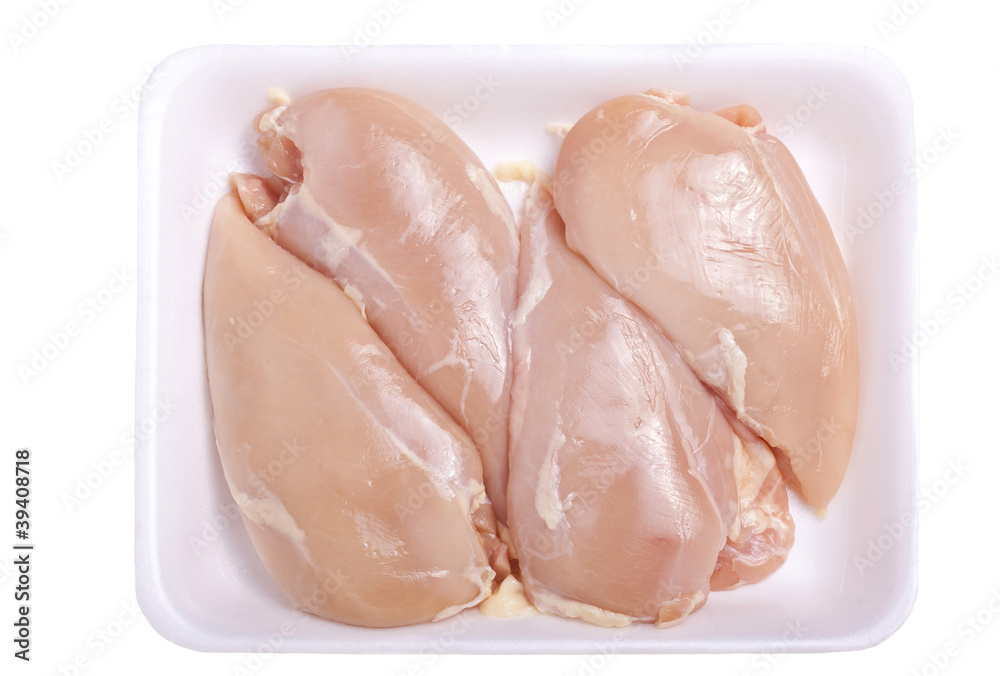 Raw chicken breast on a styrofoam tray Raw chicken breast on a styrofoam tray