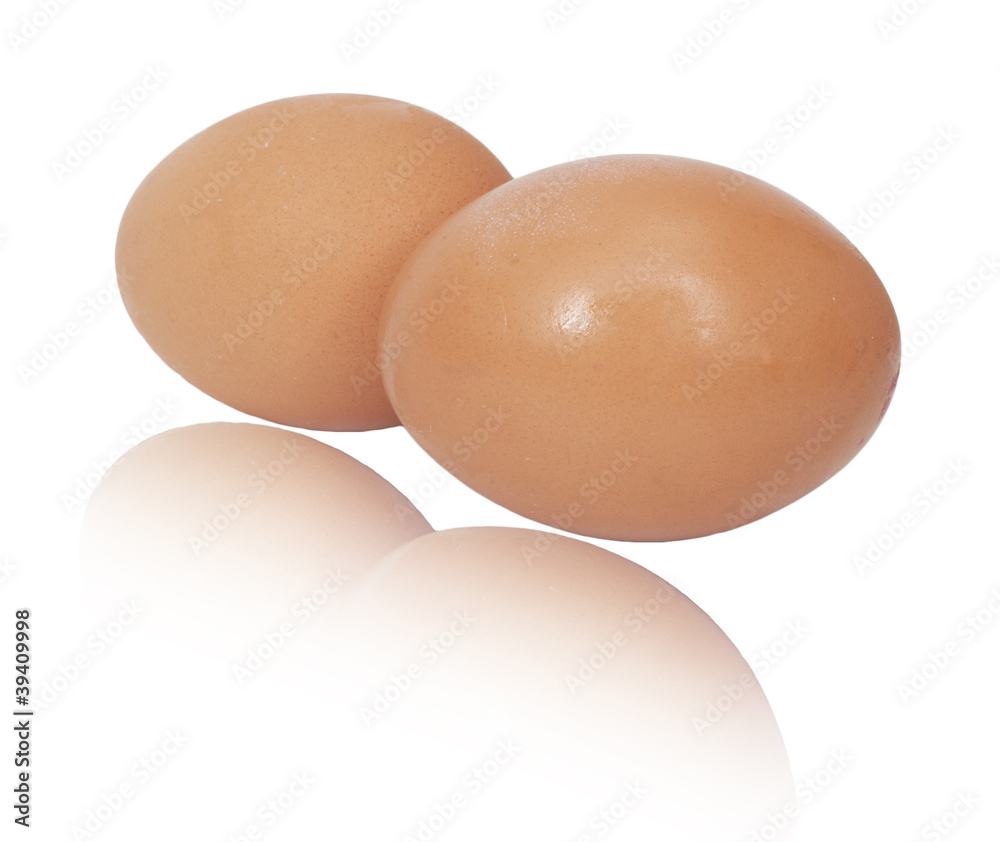two brown eggs isolated on white background two brown eggs isolated on white background