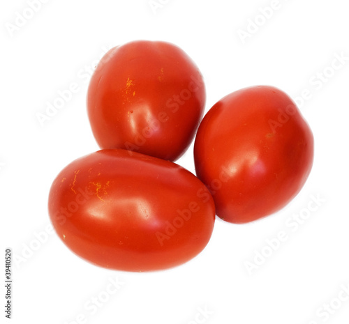 three tomatoes on white background