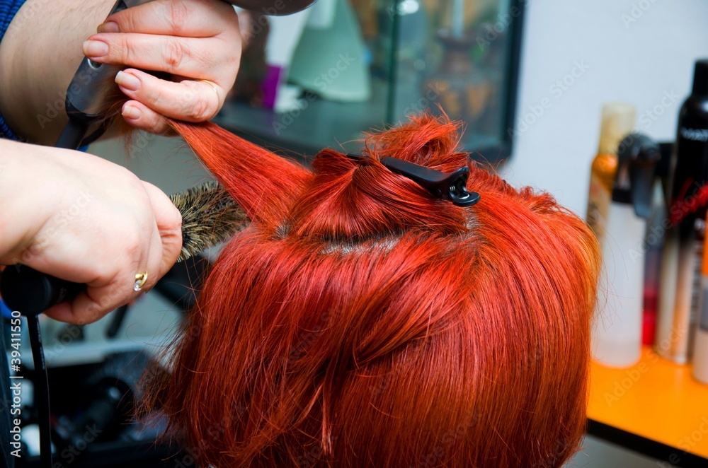 Naklejka premium women having her hair cut