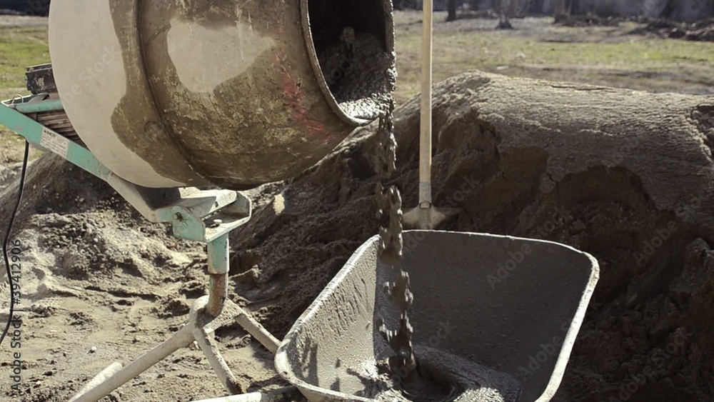 cement mixer and wheelbarrow