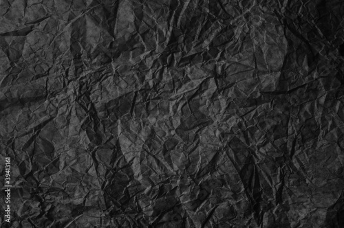 Black crumpled paper