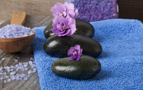 stones with purple flower and lavender salt