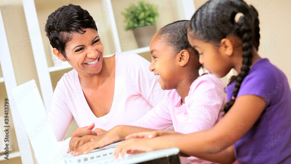 Little Ethnic Girls Using Laptop Computer Little Ethnic Girls Using Laptop Computer
