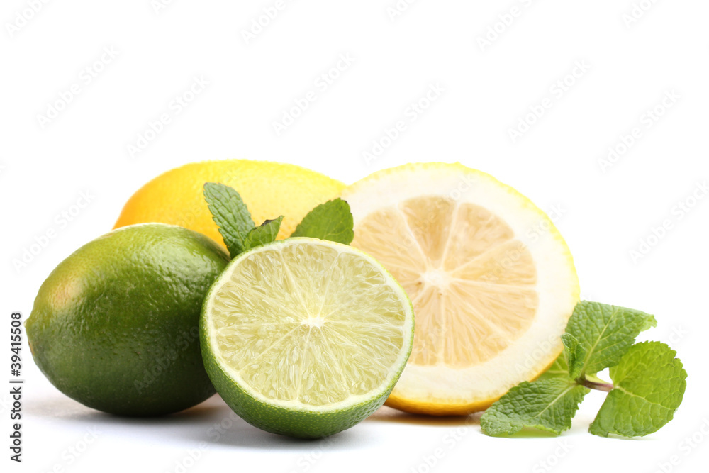 Fresh lime and lemon with mint isolated on white Fresh lime and lemon with mint isolated on white