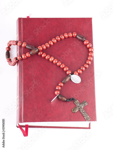 rosary on holy bible