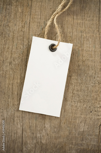 price tag over wood background