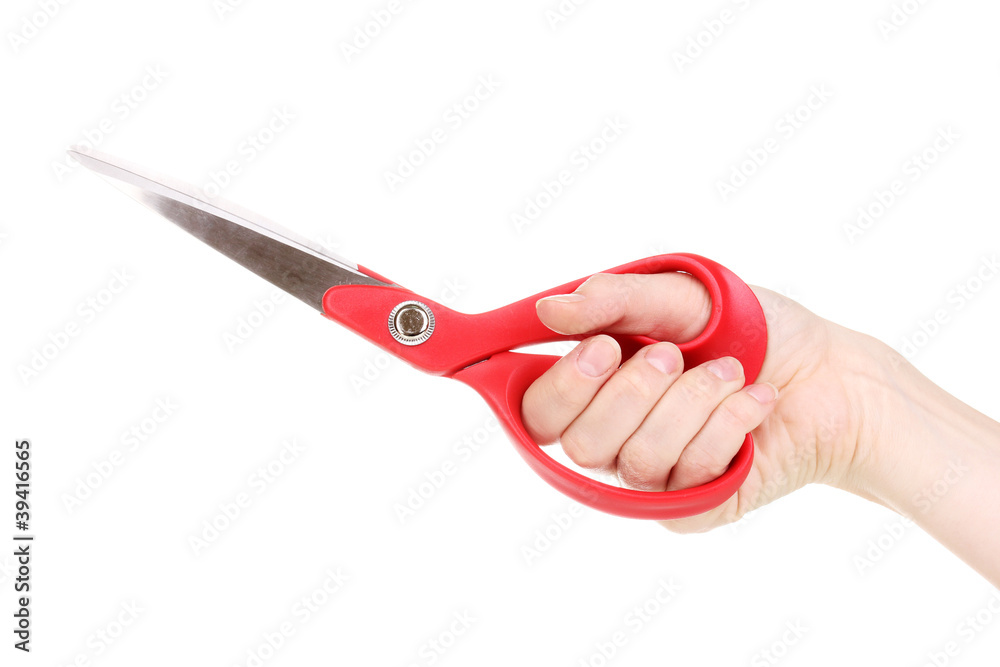 Sewing scissors in hand isolated on white Sewing scissors in hand isolated on white