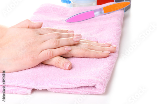 beautiful women hands on pink towel