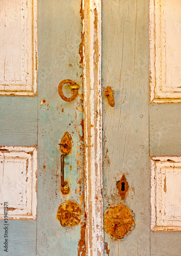 Wooden grey door  in monastery Ivironon Athos in Greece © imagIN photography