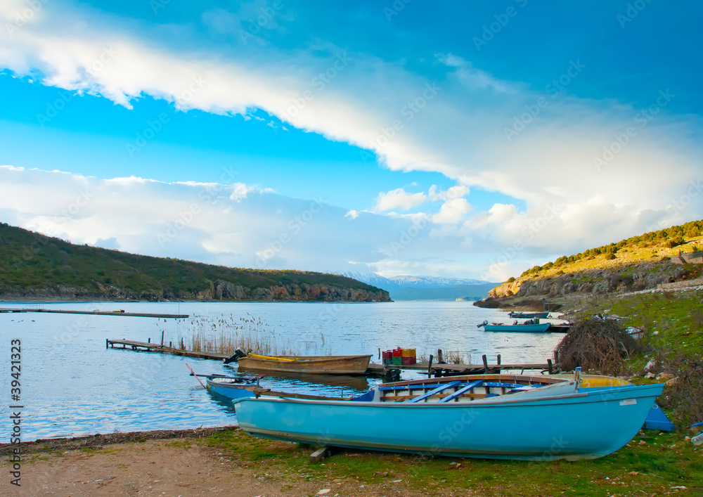 Old wooden fishing boat in the lake Prespa in northern Greece.