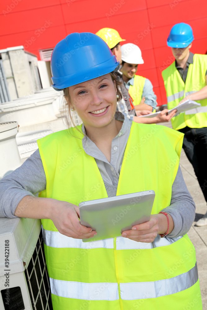 Portrait of smiling student girl in professional training Portrait of smiling student girl in professional training