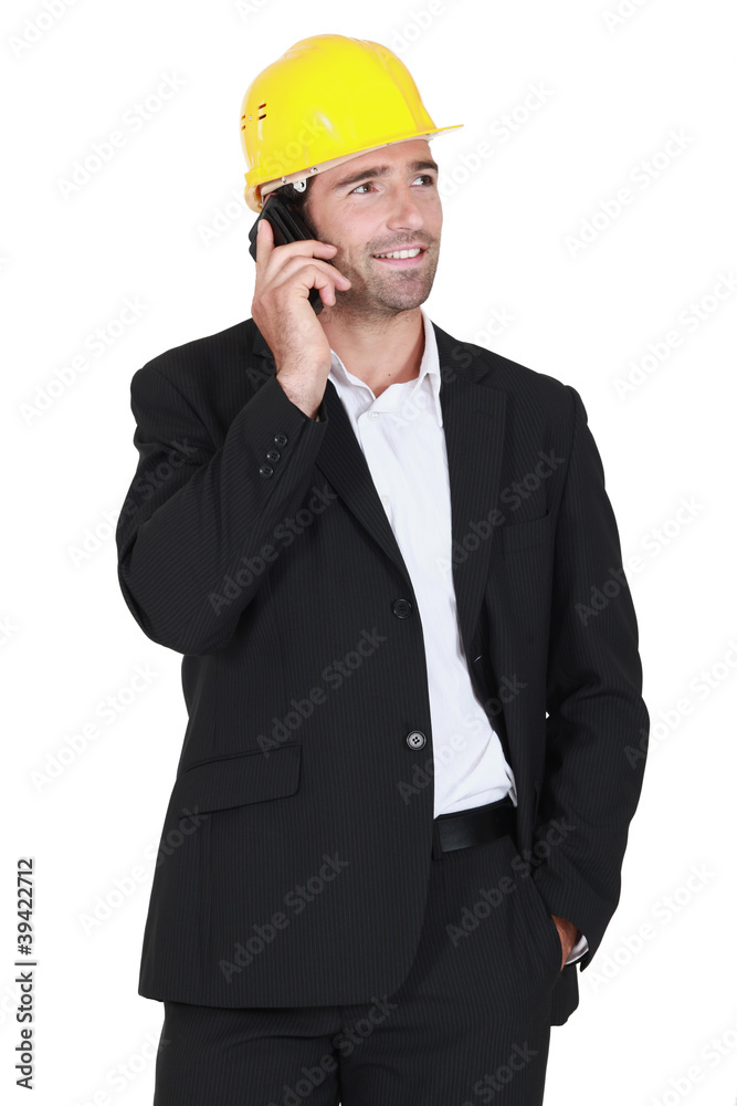 Engineer talking on his mobile phone Engineer talking on his mobile phone