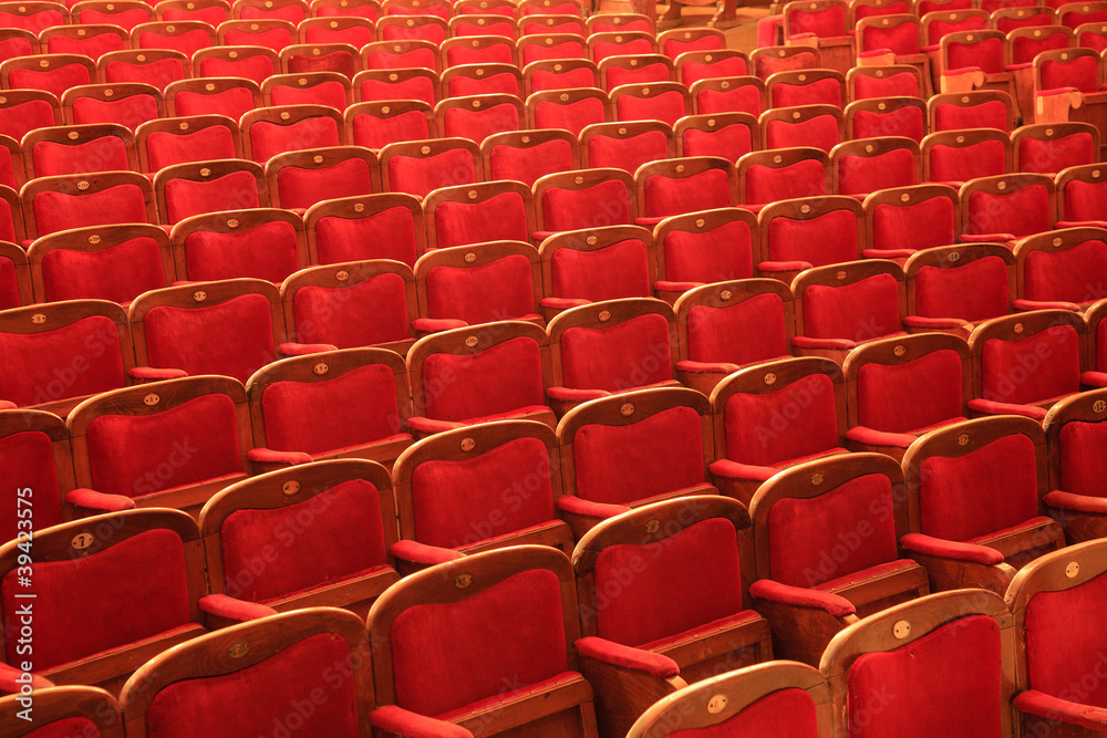 Fototapeta premium Rows of red chairs