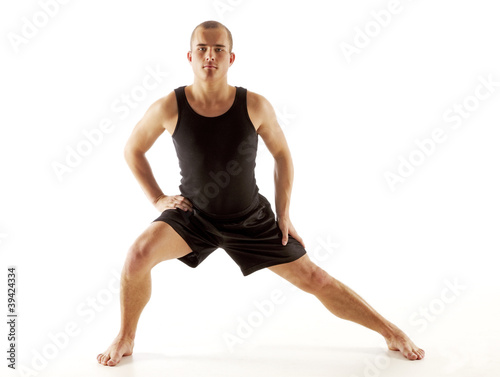 Young man stretching