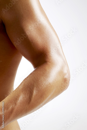 muscular arm and chest