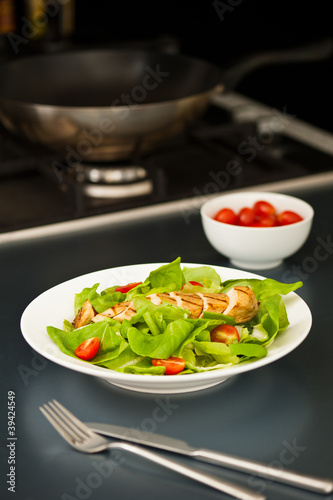 Sliced chicken breast as salad ingredient