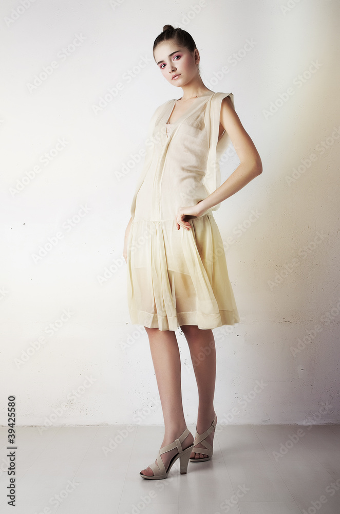 Beautiful woman with elegant white dress. Fashion style Beautiful woman with elegant white dress. Fashion style
